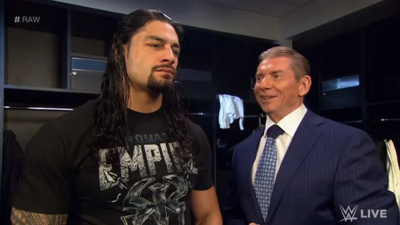 Vince y Roman Reigns