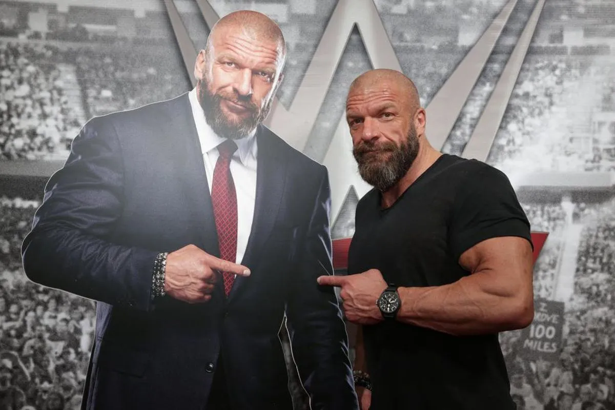 Triple H pose